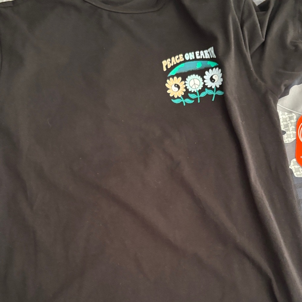 Wonder Nation Black Tee with Peace on Earth Floral Design